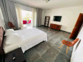 gacuriro-fully-furnished-5bedrooms-house-for-rent-at-4000-in-good-location-small-12