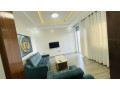 remera-near-amahoro-stadium-2bedrooms-fully-furnished-apartment-for-rent-at-800k550usd-small-0