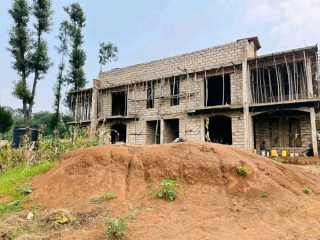 Plot with unfinished house for sale in Kinyinya