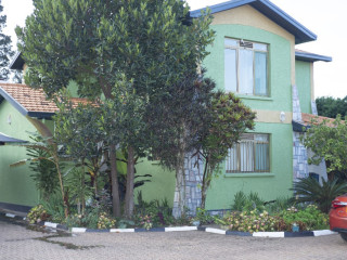 DB 184B Gacuriro Gacuriro well furnished house for rent with shared swimming pool in Kigali Rwanda
