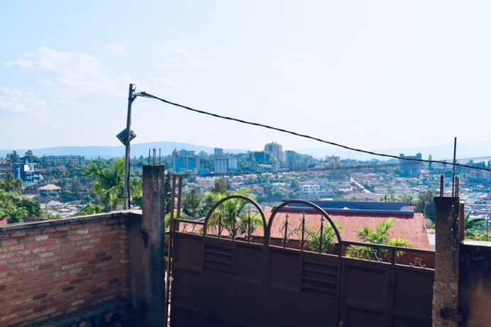 remera-near-amahoro-stadium-fully-furnished-2bedrooms-apartment-for-rent-at-550k375-in-good-location-big-1