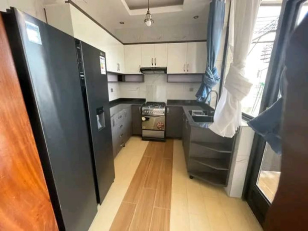kimironko-beautiful-and-new-contemporary-house-for-sale-in-good-neighborhood-it-has-very-spacious-double-height-living-room-big-10