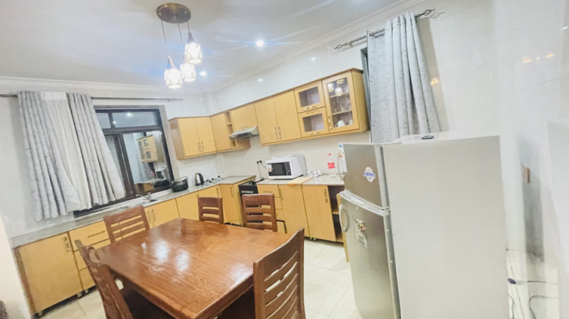 remera-near-amahoro-stadium-2bedrooms-fully-furnished-apartment-for-rent-at-700k480usd-on-tarmac-road-big-10