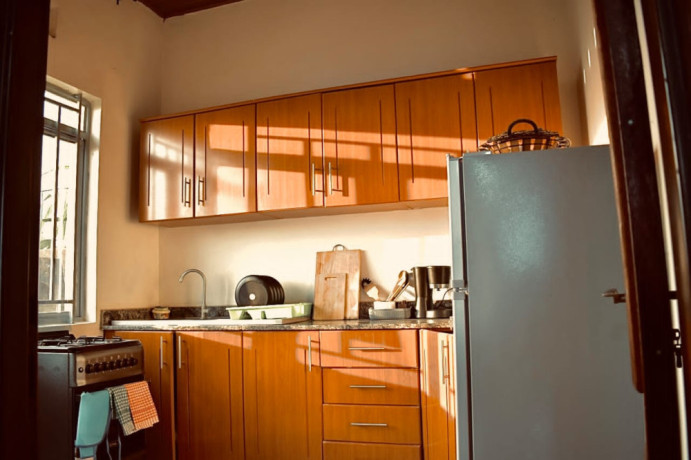 remera-near-amahoro-stadium-fully-furnished-2bedrooms-apartment-for-rent-at-550k375-in-good-location-big-12