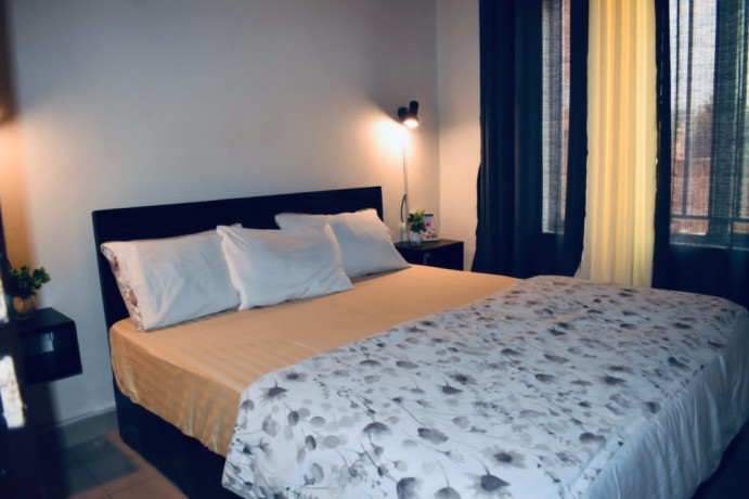 remera-near-amahoro-stadium-fully-furnished-2bedrooms-apartment-for-rent-at-550k375-in-good-location-big-5