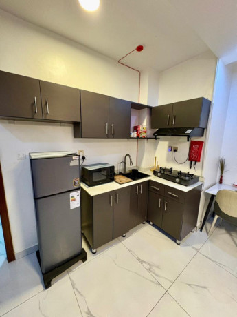 remera-near-amahoro-stadium-fully-furnished-1bedroom-apartment-for-rent-at-650k450-in-good-location-big-8