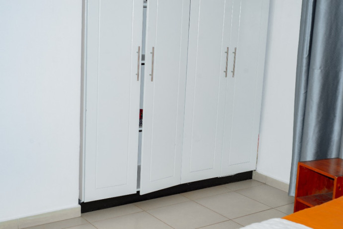 db-184b-gacuriro-gacuriro-well-furnished-house-for-rent-with-shared-swimming-pool-in-kigali-rwanda-big-9