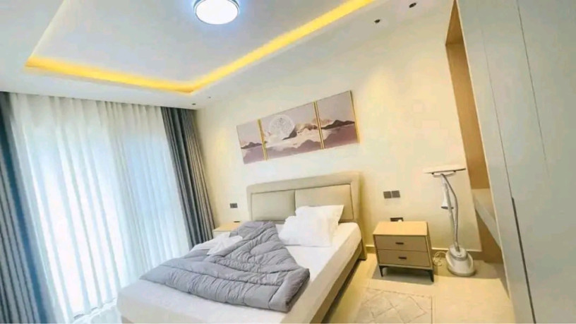 remera-near-amahoro-stadium-2bedrooms-fully-furnished-apartments-for-rent-at-800k550usd-on-tarmac-road-big-2