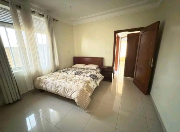 gacuriro-2bedrooms-fully-furnished-apartment-for-rent-at-800k550-on-tarmac-road-big-1