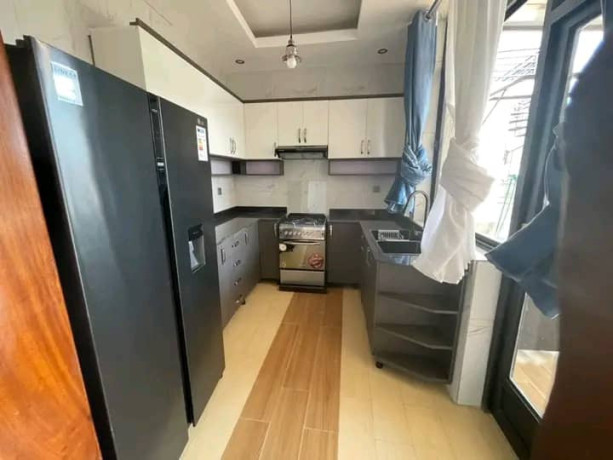 kimironko-beautiful-and-new-contemporary-house-for-sale-in-good-neighborhood-it-has-very-spacious-double-height-living-room-big-9